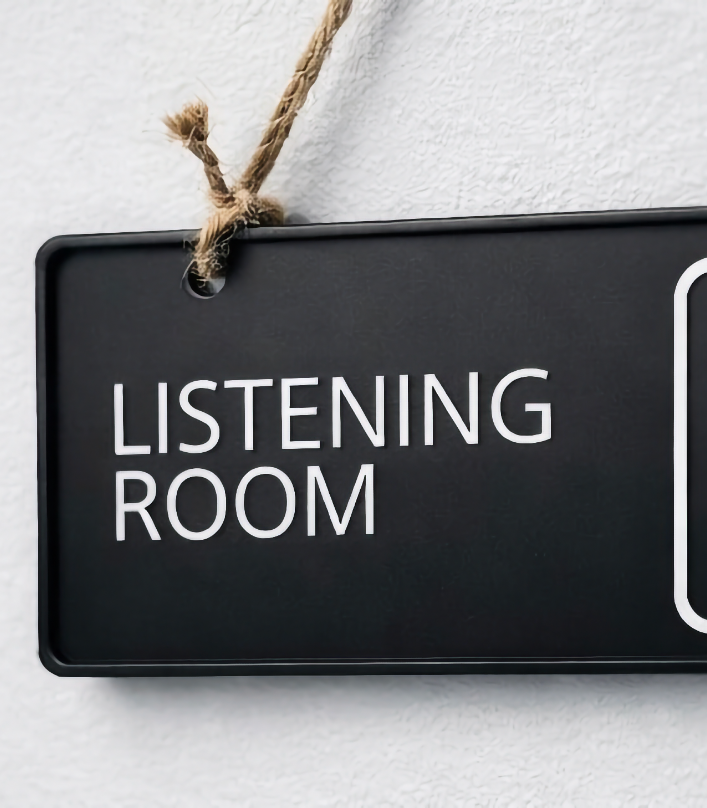 close shot of listening room sign