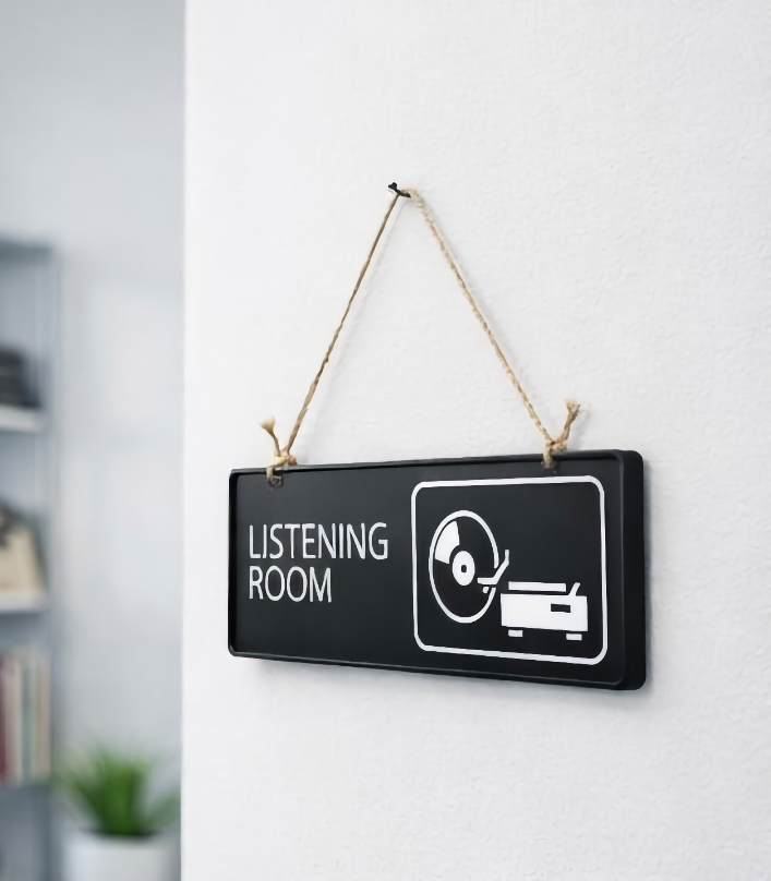 right angle shot of listening room sign