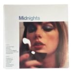 Product photo of Midnights album sleeve and blue vinyl