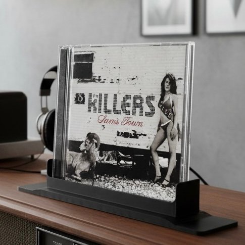 Photoroom_20260919_162651 Matte Black CD Display Stand | Ultra Minimalist "Now Playing" Jewel Case Holder with Contoured Feet (Copy) - Image 1