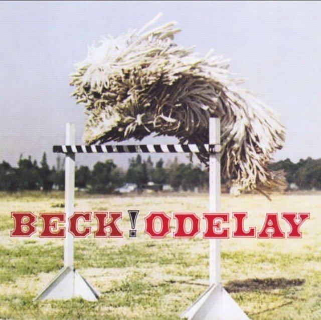Becks Odelay album cover featuring a shaggy Komondor dog leaping over a hurdle.