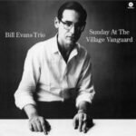 Black-and-white album cover for Sunday At The Village Vanguard by the Bill Evans Trio.