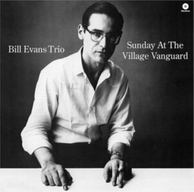 Black-and-white album cover for Sunday At The Village Vanguard by the Bill Evans Trio.