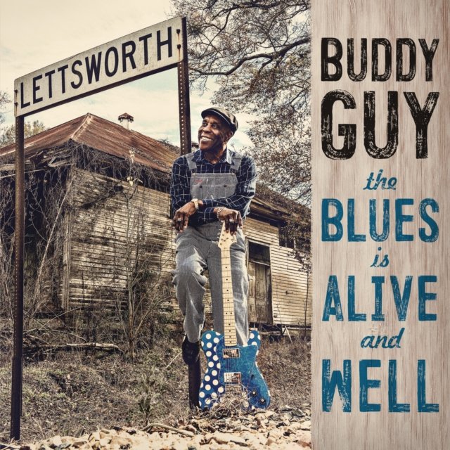 Album cover for Buddy Guys The Blues Is Alive and Well featuring a polka-dot guitar.