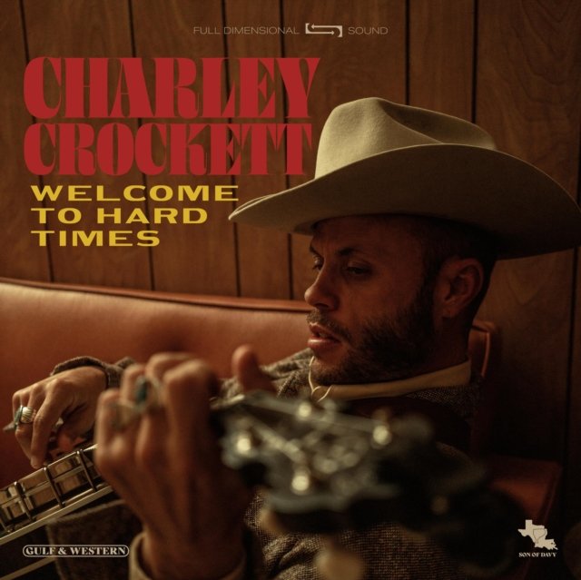 Charley Crockett holding a banjo on the album cover for Welcome to Hard Times.