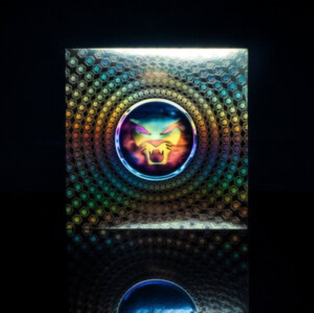 Iridescent holographic card featuring a glowing feline emblem on a dark reflective surface.