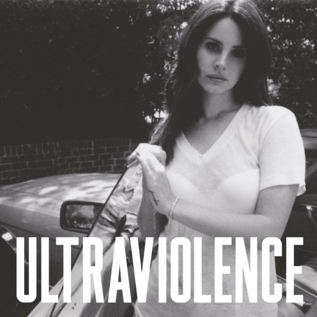 Lana Del Rey on the black-and-white Ultraviolence album cover leaning against a car.