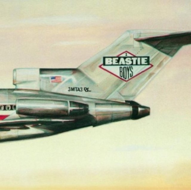 Beastie Boys Licensed to Ill album cover featuring a polished metallic jet tail.