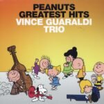 Peanuts Greatest Hits album cover by Vince Guaraldi Trio featuring Snoopy and friends.