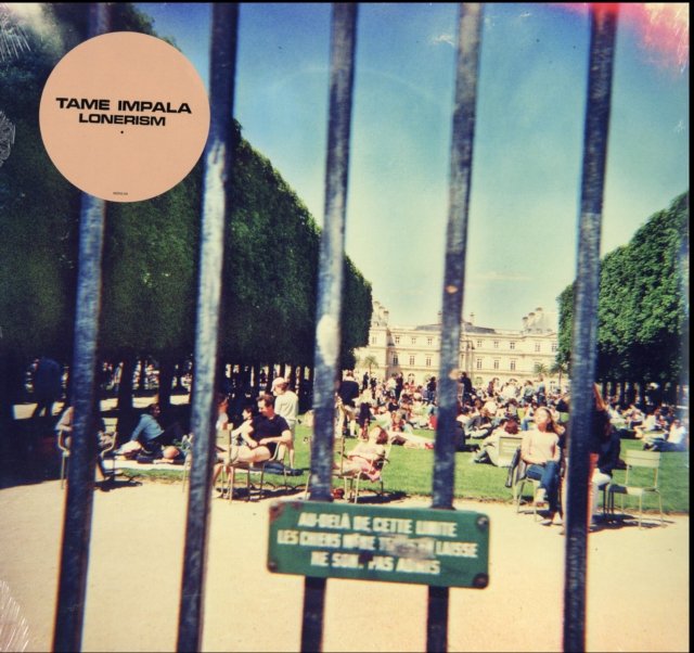 Album cover art for Tame Impalas Lonerism featuring a Paris park behind a fence.