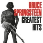Bruce Springsteen Greatest Hits album cover featuring the artist in a leather jacket with guitar.