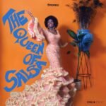 Album cover for Celia Cruzs The Queen of Salsa in a peach ruffled dress.
