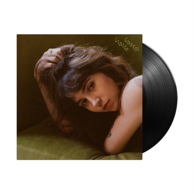 Clairo Charm vinyl record album with black LP disc slipping out of sleeve.