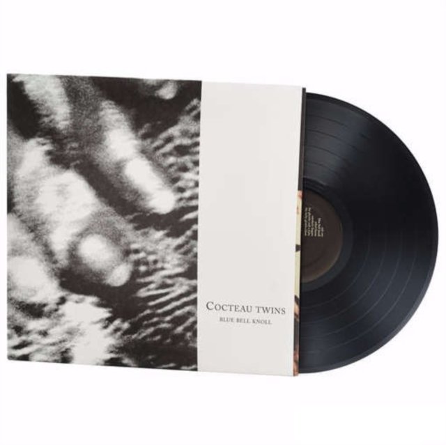 Cocteau Twins Head Over Heels vinyl record partially pulled out of its cover.
