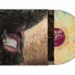 Custom splatter vinyl LP record featuring a colorful disc and an illustrated album sleeve.