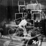 Black-and-white photo collage artwork for Elliott Smiths album XO.
