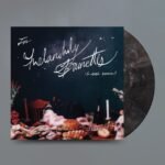 For Melancholy Brunettes vinyl album with smoky black marble LP and gothic artwork.
