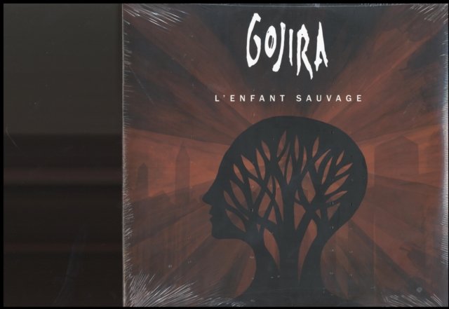Album cover for Gojiras LEnfant Sauvage featuring a tree branch head silhouette.