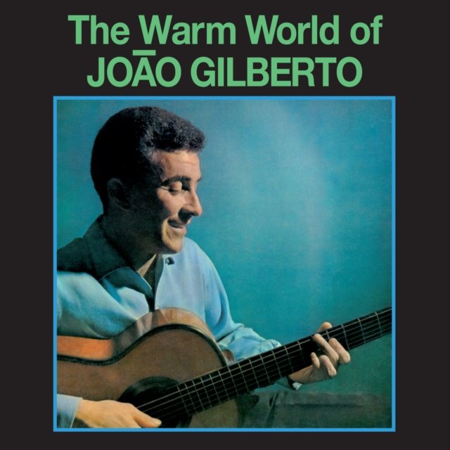 Album cover art for The Warm World of João Gilberto playing an acoustic guitar.