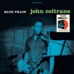 Album cover for John Coltranes Blue Train featuring a blue-tinted portrait with saxophone.