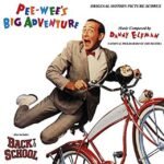 Soundtrack album cover for Pee-wees Big Adventure featuring Pee-wee Herman flying behind his bicycle.