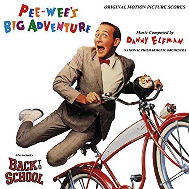 Soundtrack album cover for Pee-wees Big Adventure featuring Pee-wee Herman flying behind his bicycle.