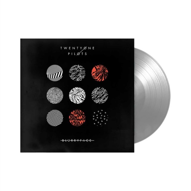Twenty One Pilots Blurryface vinyl LP record slipping out of its black album cover.